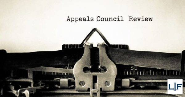 Appeals Council Review typed onto a piece of paper that is sticking out of an old fashioned typewriter